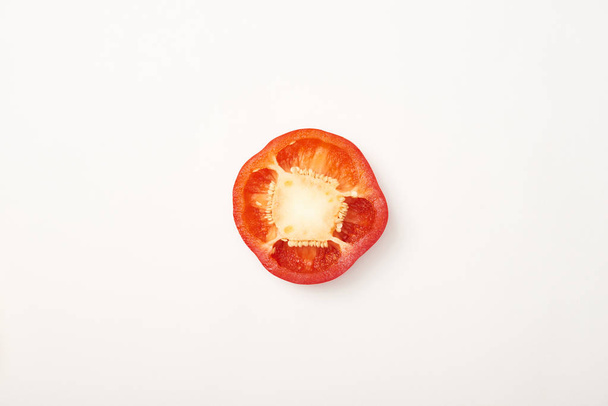 Studio shot of cut bell pepper on white background - Foto, afbeelding