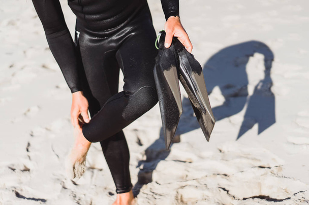 surfer with holding flippers - Photo, Image