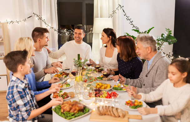 happy family having dinner party at home - Zdjęcie, obraz