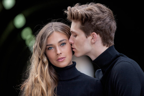 beautiful model fashion couple kissing wearing winter clothing, - Fotó, kép