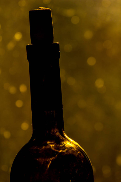 bottle of wine by the window - Foto, immagini