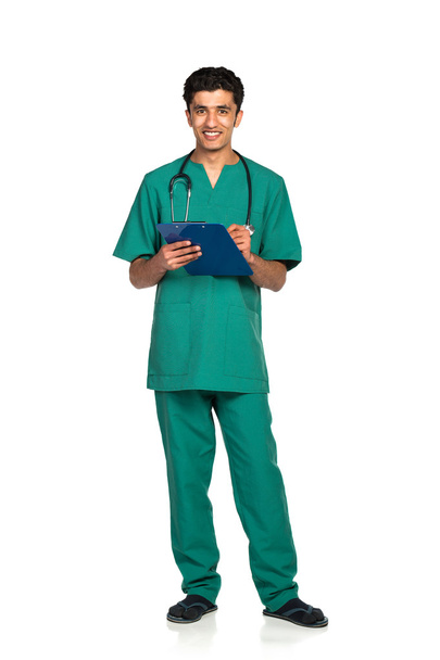 Portrait of doctor with health record on white background - Φωτογραφία, εικόνα
