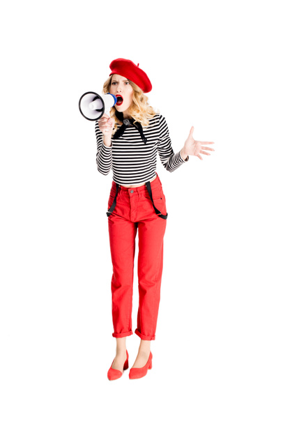 angry woman in red beret screaming in megaphone isolated on white - Foto, imagen