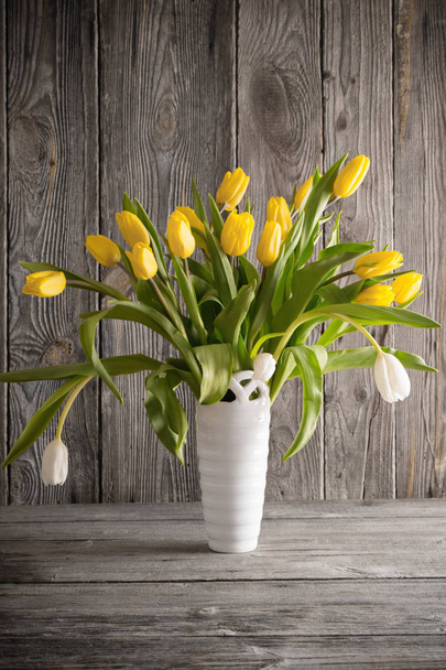 tulips over wooden background - Photo, image