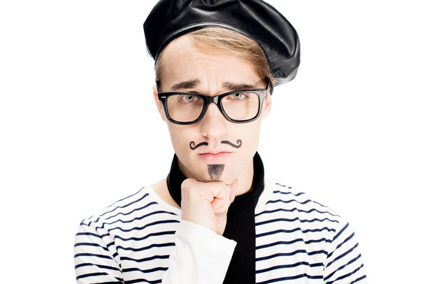 upset french man with mustache in black beret isolated on white  - Foto, afbeelding