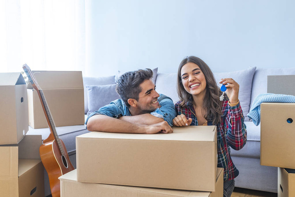 Young couple with keys in new home  - Photo, Image