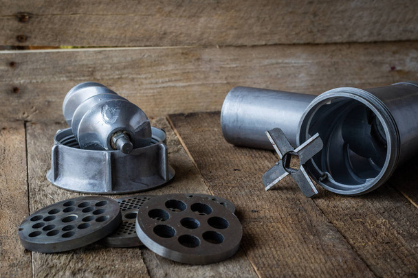 Tools for meat grinder on the kitchen table. - Fotoğraf, Görsel