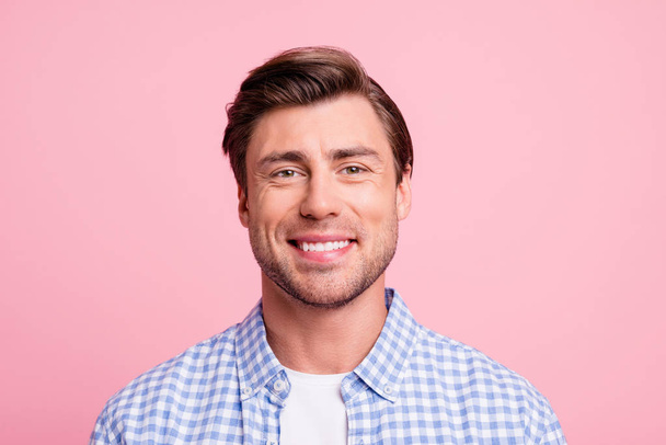 Close up photo of amazing he him his man looking straight on camera ready for new beginning wearing casual plaid shirt outfit isolated on pale rose background - Zdjęcie, obraz