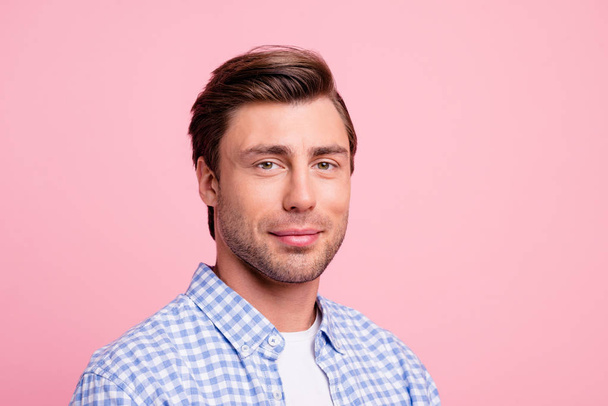 Close up photo of attractive amazing he him his man standing calm down just looking on camera wearing casual plaid shirt outfit isolated on pale rose background - Foto, Imagen