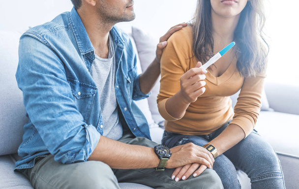 Close up of young couple with pregnancy test  - Photo, image