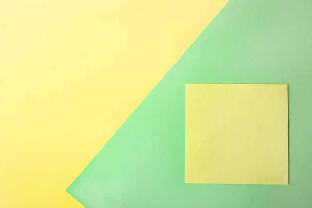 Yellow sticker on beautiful color bright juicy summer background, yellow and green. Top view, copy space. - Foto, Imagen