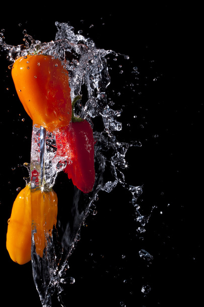 Splashing Peppers - 写真・画像