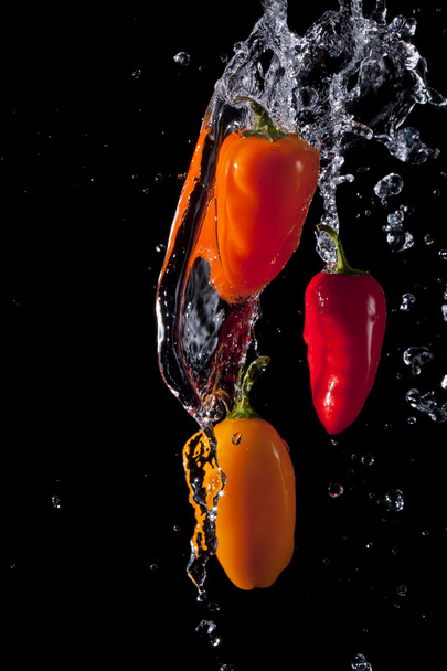 Splashing Peppers - Photo, Image
