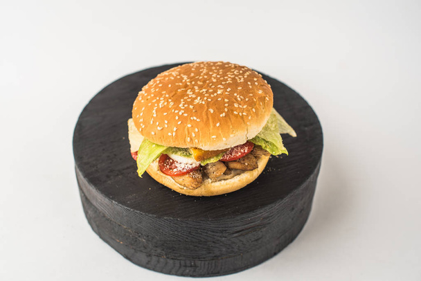 Burger. Hamburger close-up on white background  - Zdjęcie, obraz