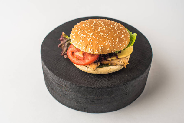 Burger. Hamburger close-up on white background - Zdjęcie, obraz