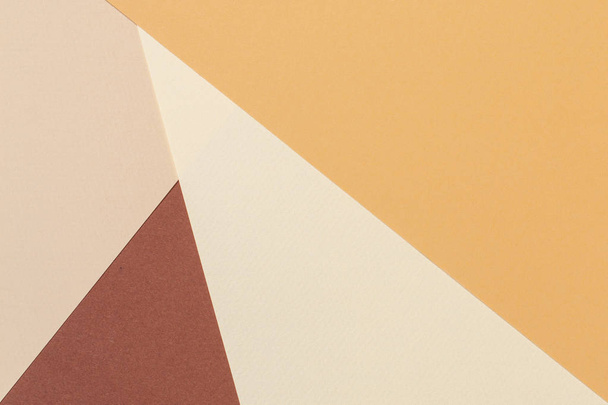 Abstract geometric paper texture cardboard background. Beige brown yellow white pastel trendy colors - 写真・画像