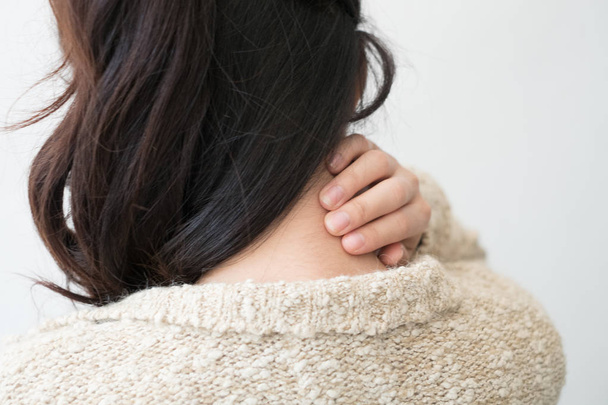 Young woman feeling exhausted and suffering from neck pain, Health concept. - Foto, Imagen