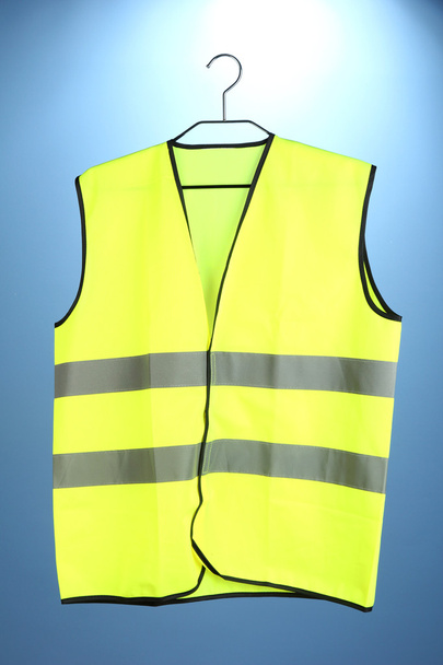 Yellow vest, on color background - Photo, Image