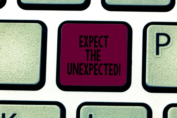 Writing note showing Expect The Unexpected. Business photo showcasing Anything could happen Not to be surprised by the event Keyboard key Intention to create computer message pressing keypad idea. - Photo, Image