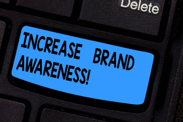 Writing note showing Increase Brand Awareness. Business photo showcasing Get influencers to display your art or product Keyboard key Intention to create computer message pressing keypad idea. - Photo, Image