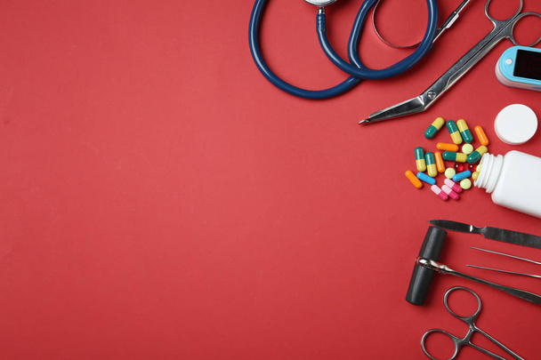 Flat lay composition with different medical objects and space for text on color background - Foto, Imagem