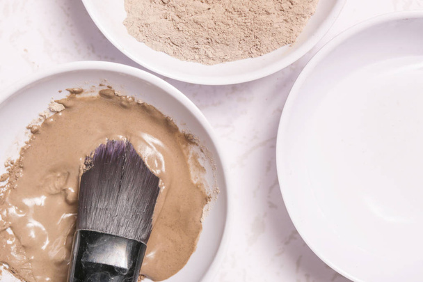 Clay powder and water - facial mask ingredients - Photo, Image