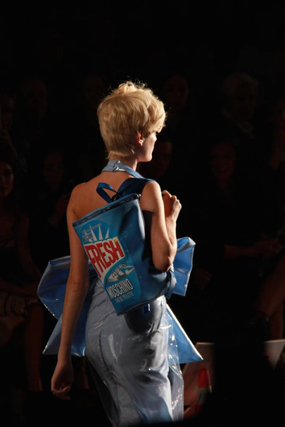 A model displays a new creation at the Moschino show during the Milan Fashion Week Spring/Summer 2016 in Milan, Italy, 24 September 2015. - Foto, immagini