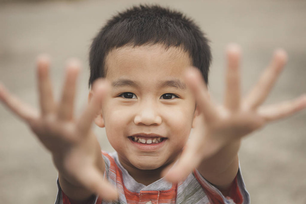 asian children playing with happiness face  - Foto, Bild