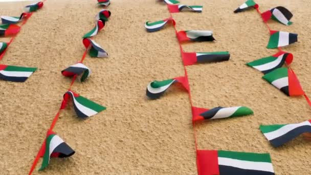 Banderas de los Emiratos Árabes Unidos renunciando al viento
 - Metraje, vídeo