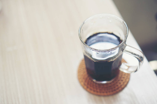 black hot coffee on table in the cafe - Φωτογραφία, εικόνα