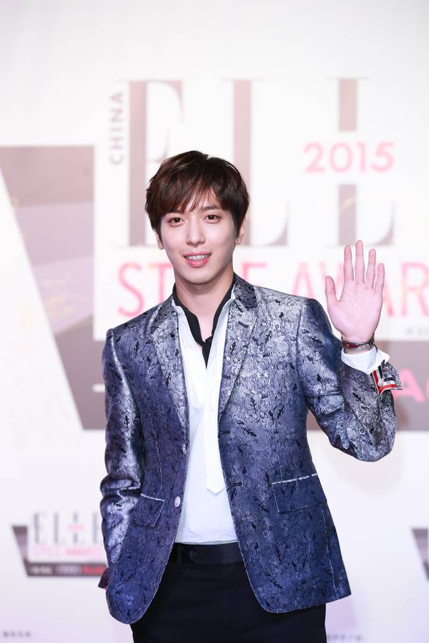 Jung Yong-hwa of South Korean boy group CNBlue arrives at the red carpet for the "2015 Voice of ELLE" Style Awards in Shanghai, China, 18 December 2015. - Zdjęcie, obraz