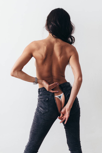 Back view of naked back young woman - Φωτογραφία, εικόνα