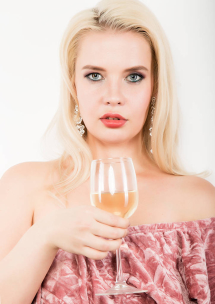 elegant blonde woman holding glass of champagne. celebration concept - Photo, Image