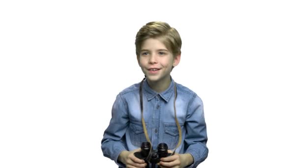 Curious preteen boy using binoculars. - Footage, Video