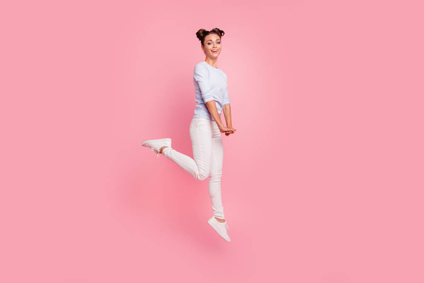 Full length body size view portrait of her she nice cute lovely attractive pretty cheerful dreamy girl walking isolated over pink pastel background - Zdjęcie, obraz