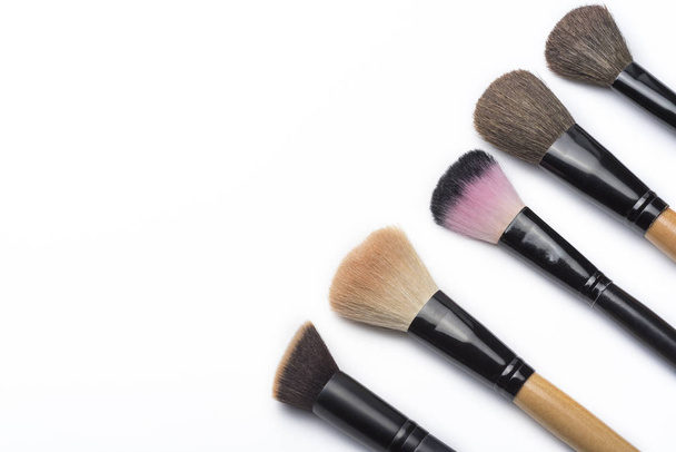 Makeup brushes on white isolated background. Set of professional makeup brushes. - Foto, Bild