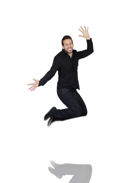 jonge man springen in vreugde - Foto, afbeelding