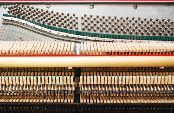 Close-up view of hammers and strings inside the piano. - Photo, Image