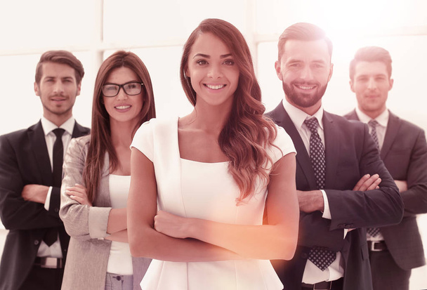 young business woman in front of the business team - Foto, Imagem