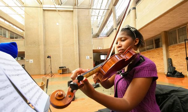 Johannesburg, South Africa - August 28 2010: Diverse youth at music school orchestra - Foto, Imagem