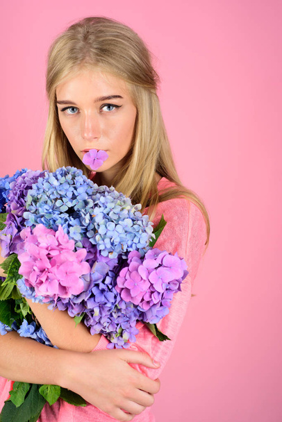 Summer beauty. girl with summer makeup. Makeup cosmetics and skincare. Spring woman with hydrangea flowers. Fashion portrait of woman. Healthy hair and skin. Enjoying every moment - Fotografie, Obrázek