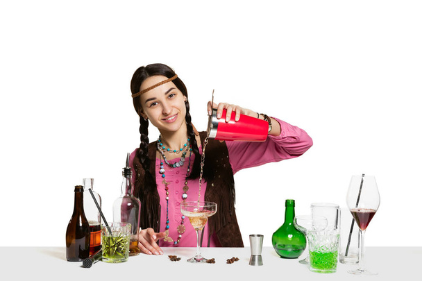 Expert female barman is making cocktail at studio - Foto, immagini