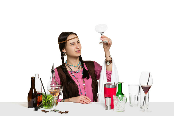 Expert female barman is making cocktail at studio - Fotografie, Obrázek