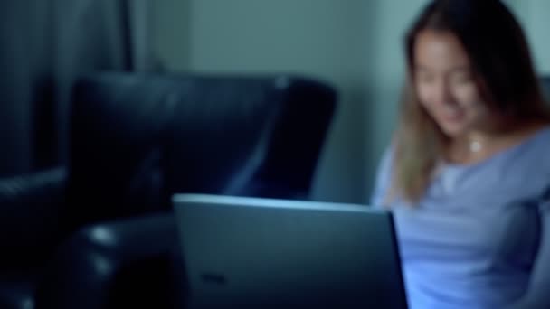 cute asian woman use laptop at night - Video
