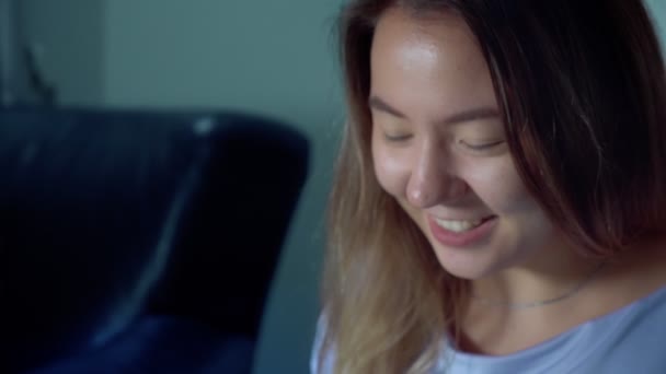 cute asian woman use laptop at night - Metraje, vídeo