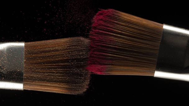 powder splash and brush for makeup artist or beauty blogger in black background - Photo, Image