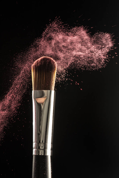 powder splash and brush for makeup artist or beauty blogger in black background - 写真・画像