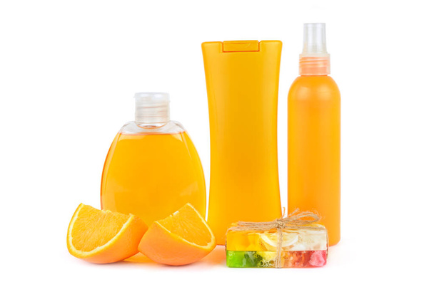 Orange natural cosmetic products: gel, lotion, serum and handmade soap. Vials isolated on white background. Face and body skin care. - Zdjęcie, obraz