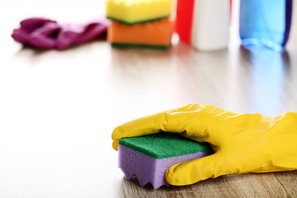 Hand in glove cleaning kitchen table - Fotografie, Obrázek