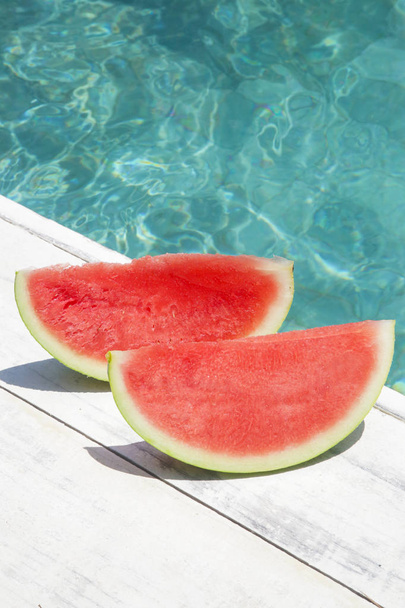 Slices of watermelon - summer holidays, vacation and food concept - Φωτογραφία, εικόνα